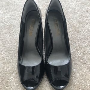 Black peep toe pumps